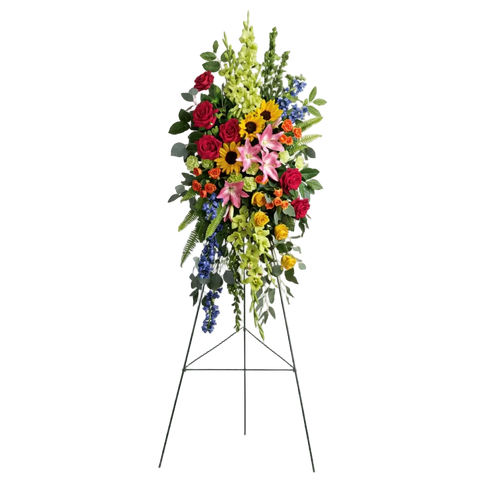 Arreglo Fúnebre, Corona y Pedestal "El Amor Vive". contiene: rosas de color rosa intenso, rosas amarillas, rosas de color naranja, lirios asiáticos rosados, gladiolos verdes, claveles verdes, girasoles amarillos medianos, delfinio azul, bupleurum, mirto, helecho espada, eucalipto dólar de plata y hoja de limón. Flores 24 Horas, Bogotá, Colombia