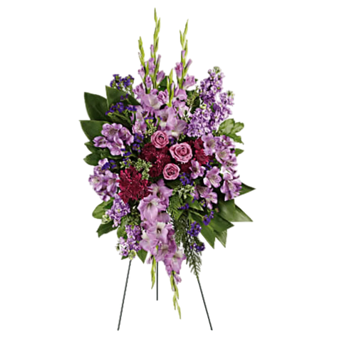 Pedestal y Arreglo Fúnebre, Corona y Pedestal "Reflejos". contiene: rosas de lavanda, alstroemeria de lavanda, gladiolos de lavanda, stock de lavanda, crisantemos en aerosol púrpura, sinuata statice púrpura, hojas verdes de ti, cedro plano, oregonia y hoja de limón. Flores 24 Horas, Bogotá, Colombia